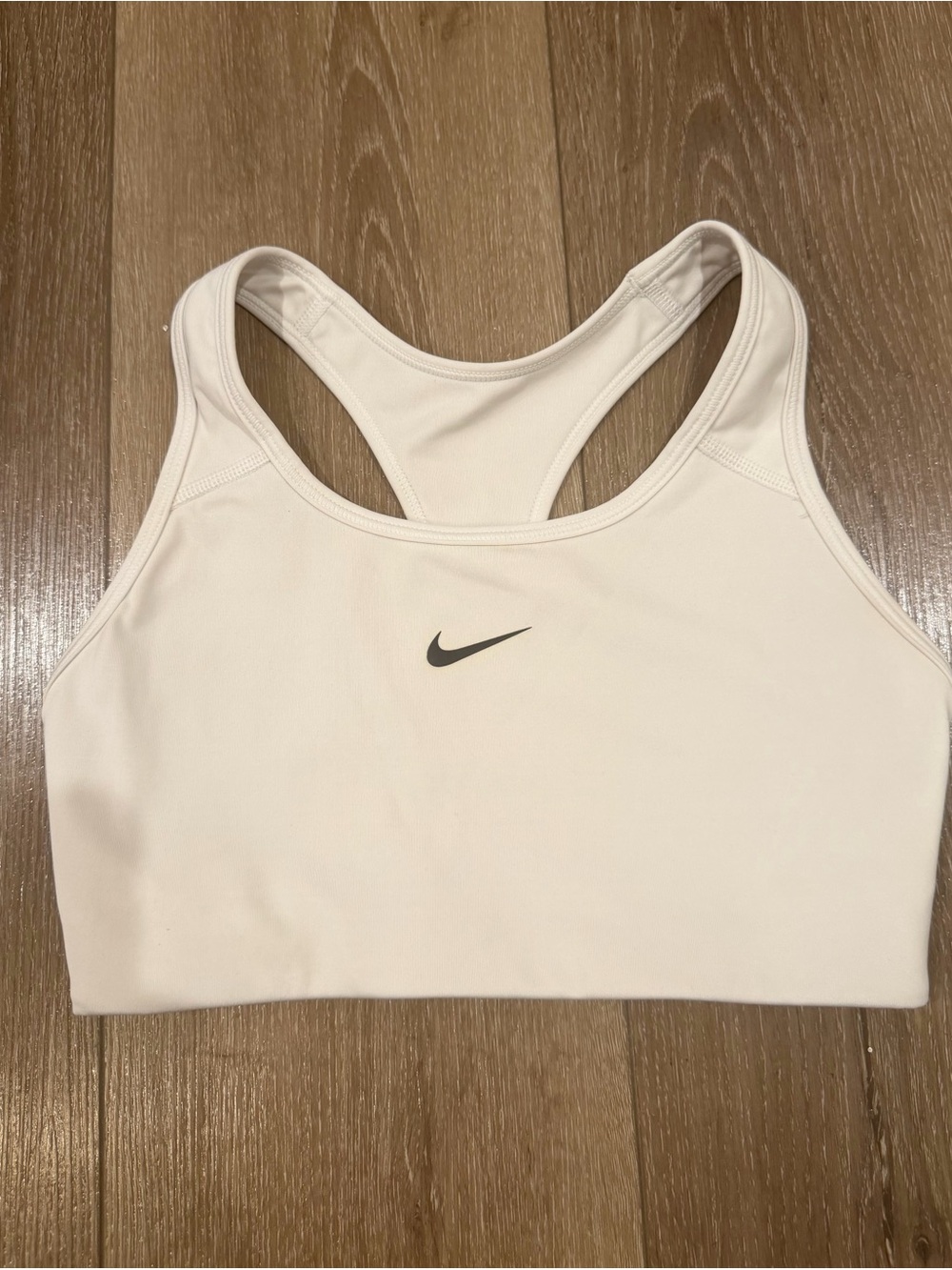 Nike Light Cream Racerback Sports Bra with Black Swoosh